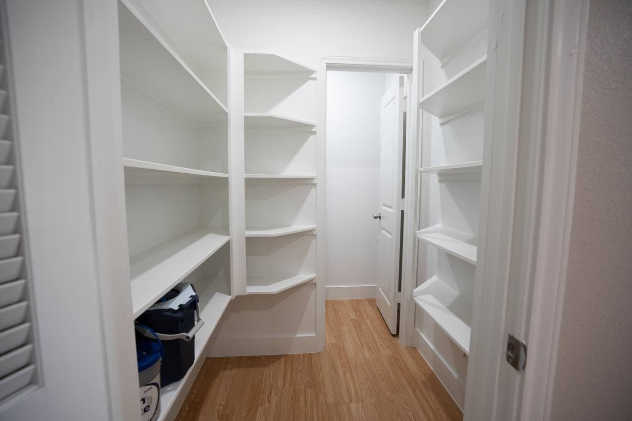 Walk-in pantry with custom shelving