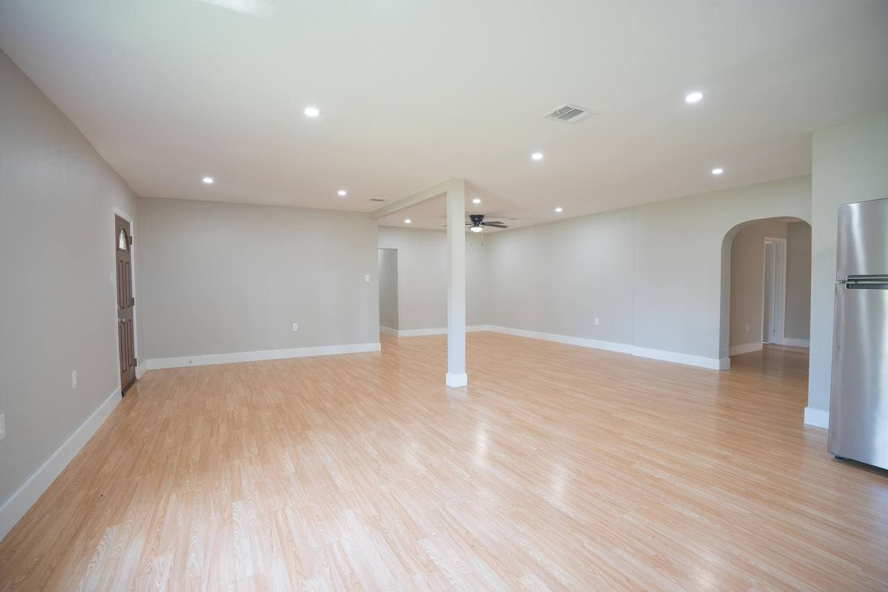 Open living area renovation with new flooring