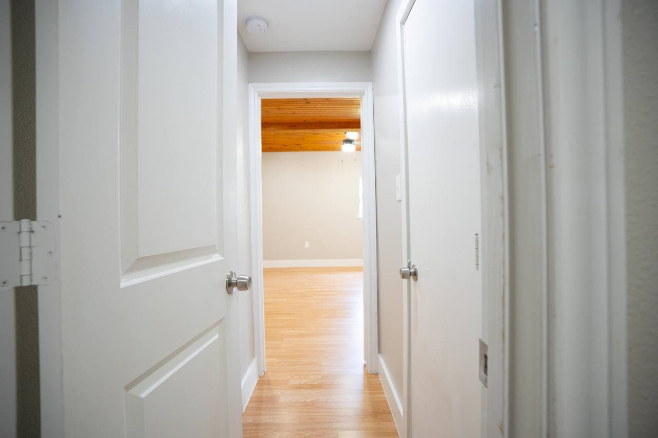 Interior hallway renovation with wood ceiling detail