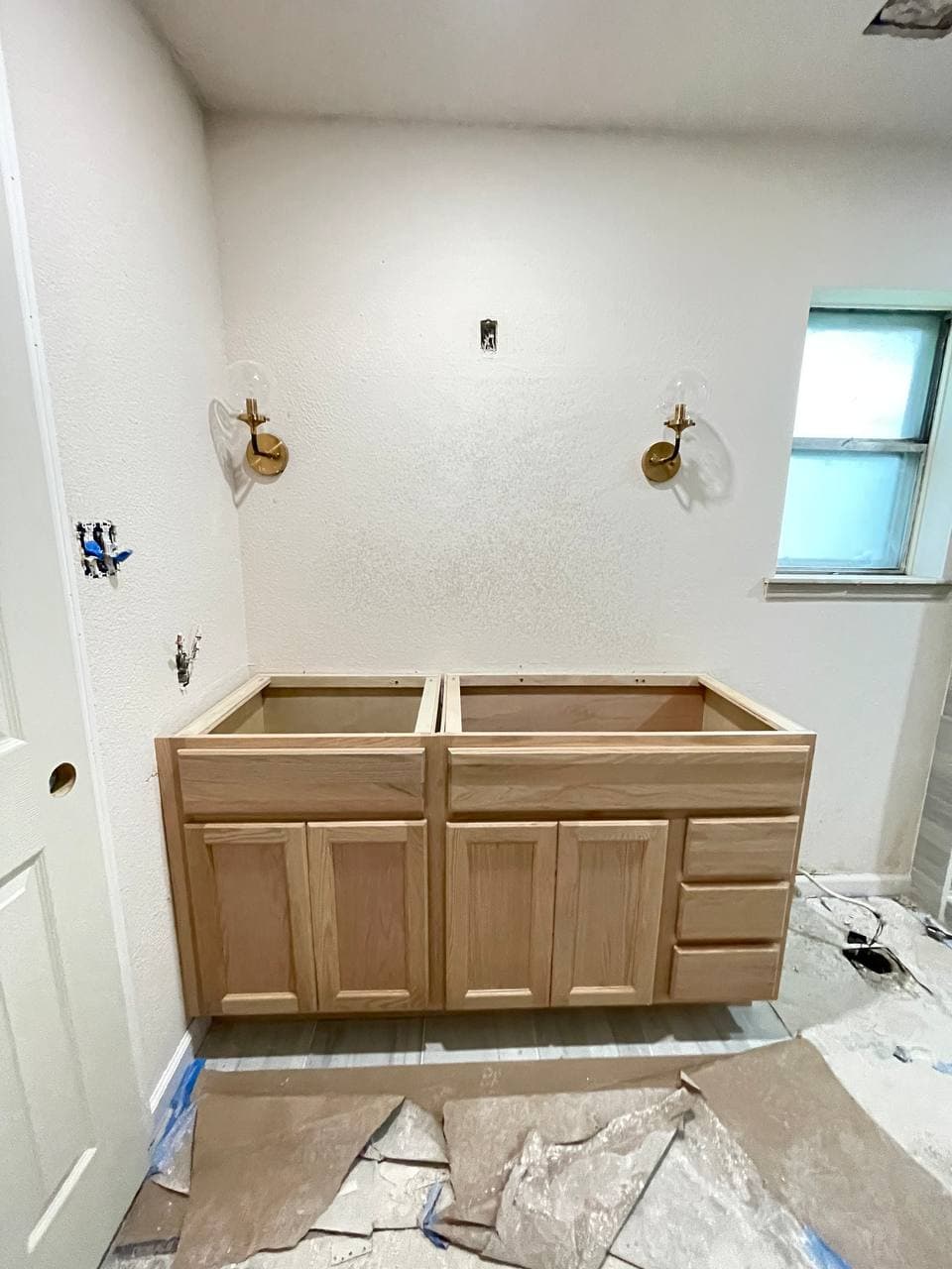Luxury kitchen remodel with quartz island and gold pendant lights