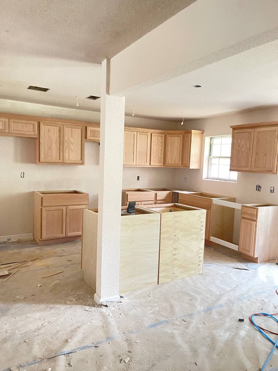 Kitchen island renovation with pendant lighting
