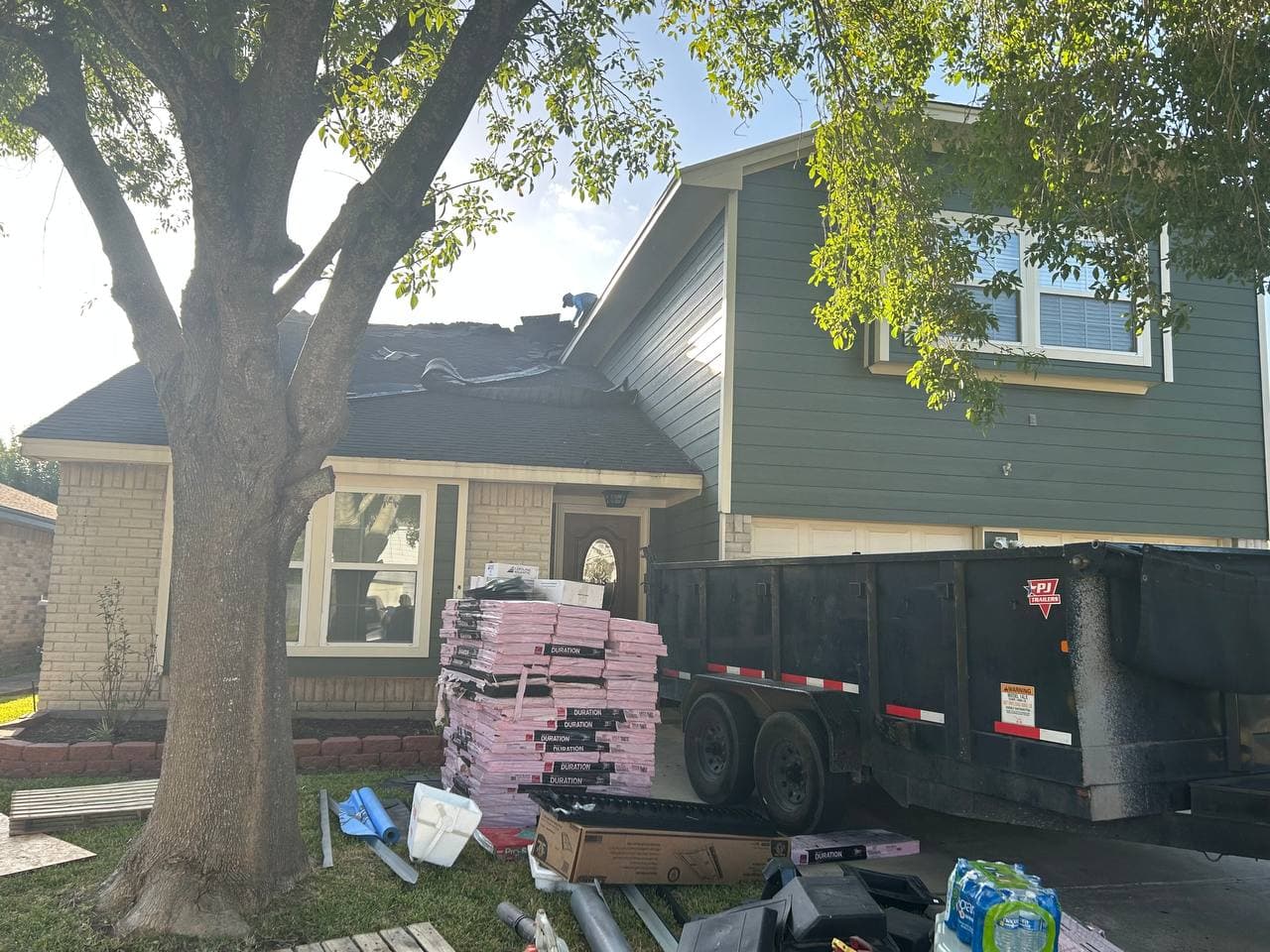 Full roof tear-off and replacement in progress