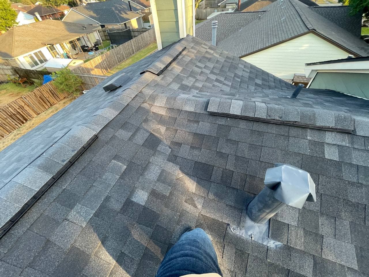 Completed shingle roof with ridge vent detail, Houston TX